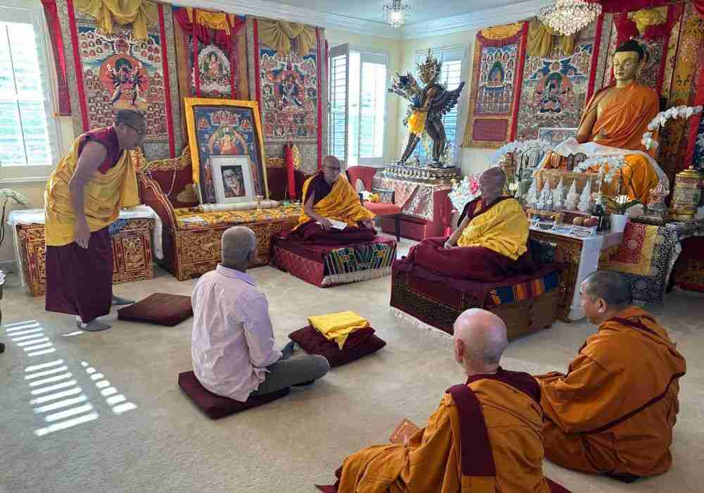 At the beginning facing Gyumed Khensur Rinpoche, my preceptor, and Jorden Rinpoche to his
right. Geshe Gelek to my left. My robes, ready to be offered in front of me.